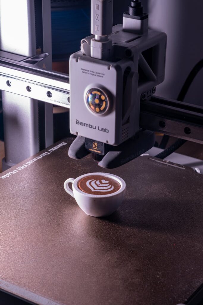 Crafting Captivating Headlines: Your awesome post title goes here A 3D printer creates intricate latte art in a coffee cup, showcasing technological innovation in food preparation.